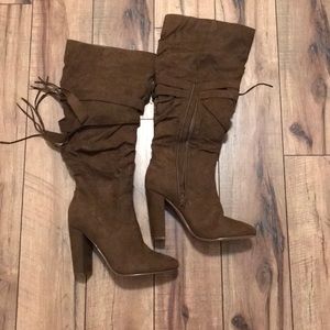 Brown zip up heeled boots